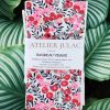 bandeau-soin-bambou-fleurs-rouges-atelier-julac Bandeau de soin visage en bambou motif fleurs rouges, avec étiquette Atelier Julac