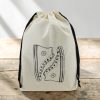 sac-a-chaussures-baskets-converses-coton-ecru Sac à chaussures baskets motif converses en coton écru - MOONLAC