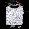 tablier-bavoir-maternelle-bambou-dino Tablier bavoir en éponge de bambou motif dinosaures pour la maternelle - Atelier Julac